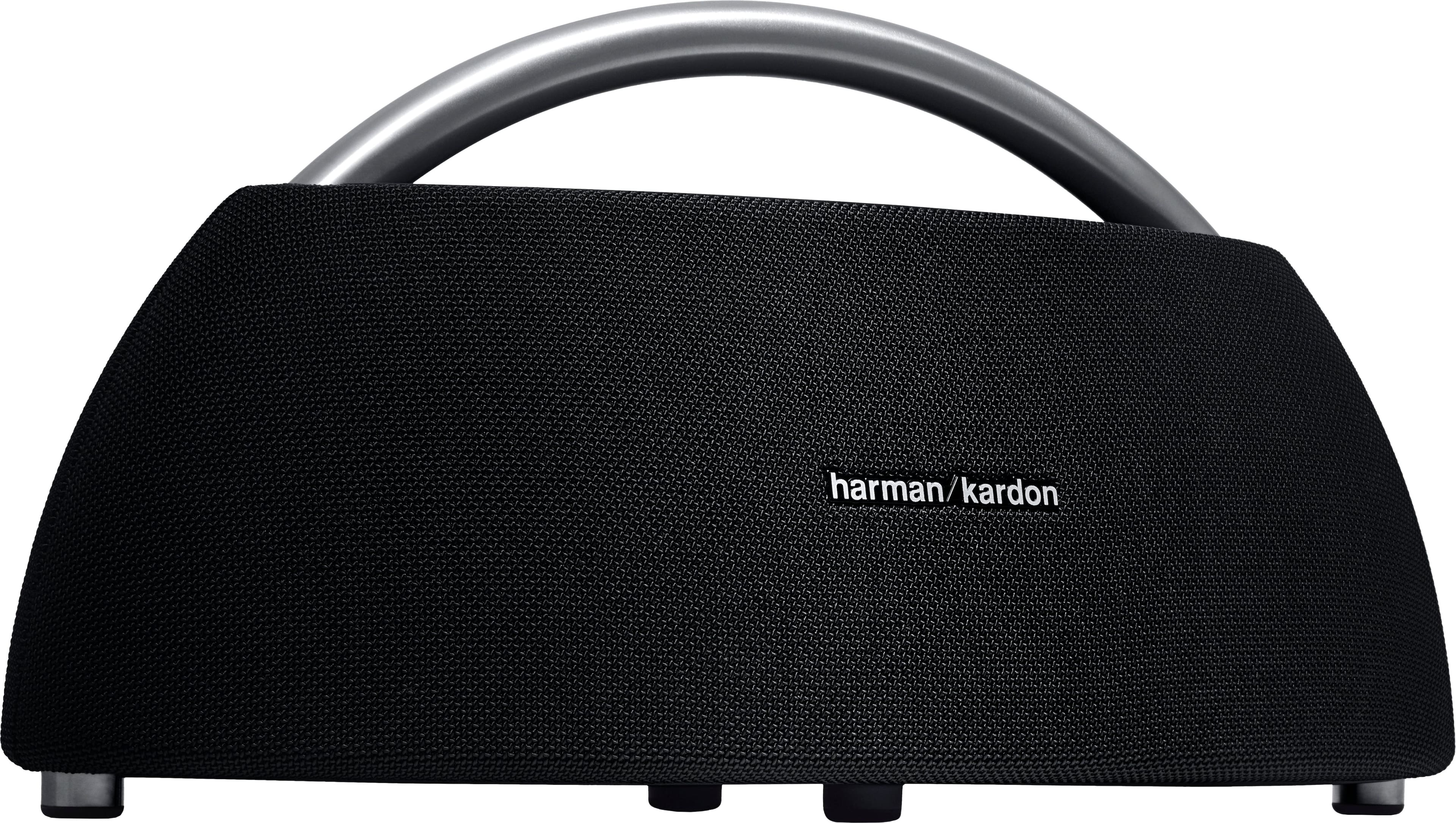 Harman Kardon Go+Play Mini speaker on a living room table