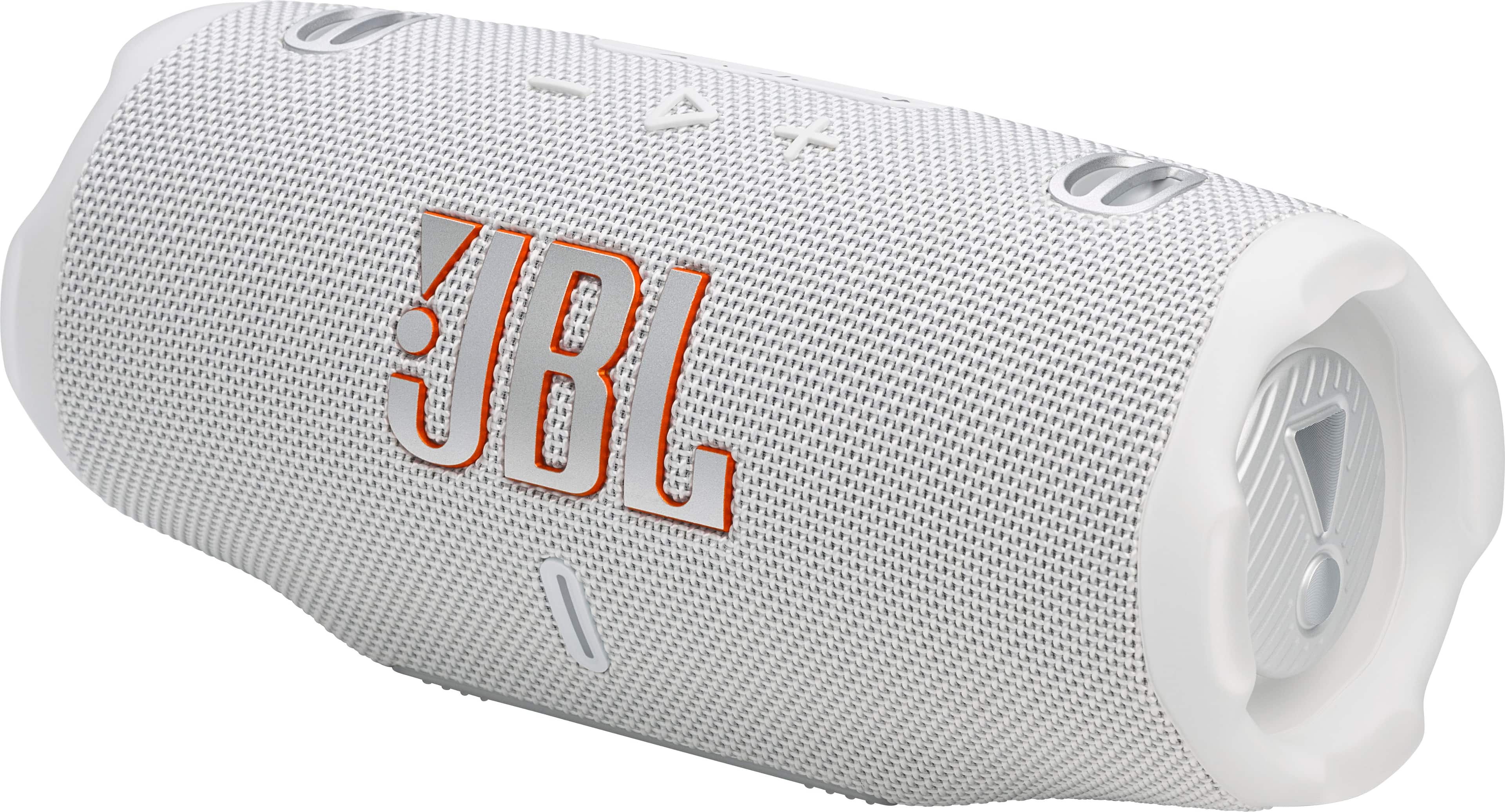 JBL Charge 6 speaker in a vibrant outdoor setting showcasing its sleek design and colors